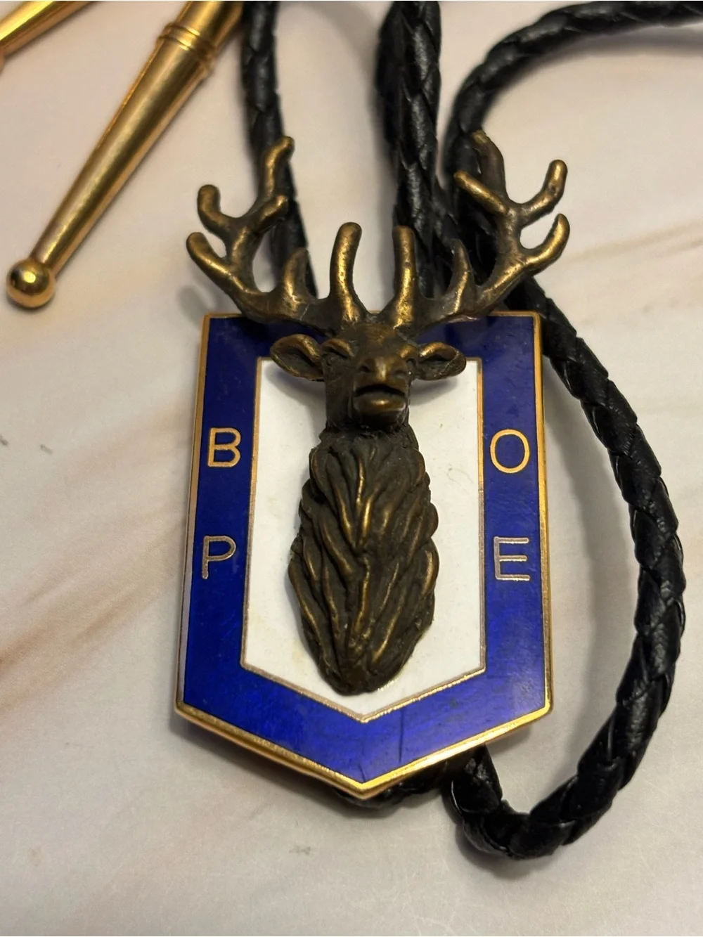 Vintage B.P.O.E. Brass Stag Bolo Tie with Blue & White Enamel Accent